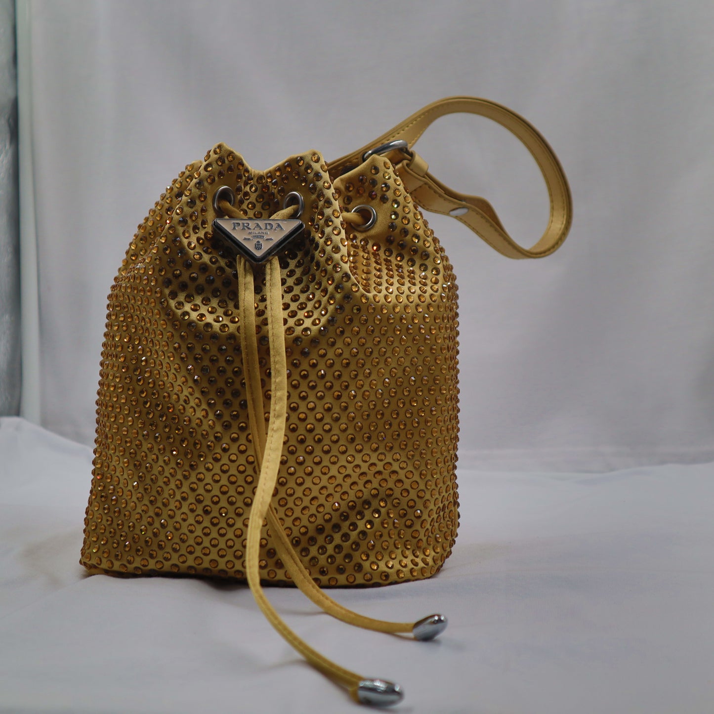 gold bucket prada gems 1.1
